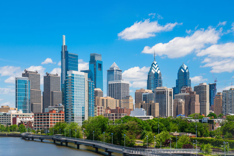 A picture of the philadelphia Skyline Taken From Park Drive Blue Sky And Few Clouds